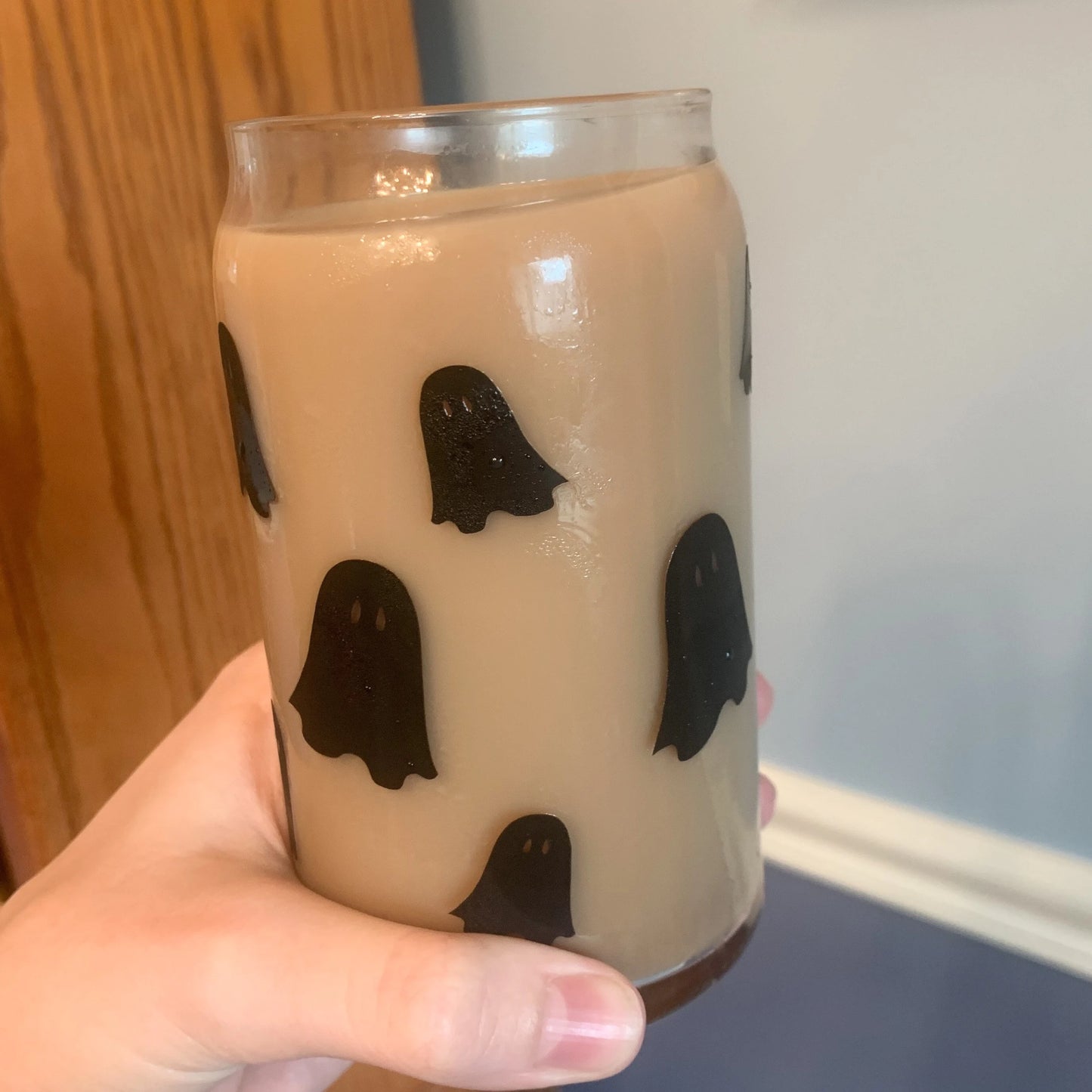 An angle of the boo glass that shows only the cute ghosts floating around the cup.